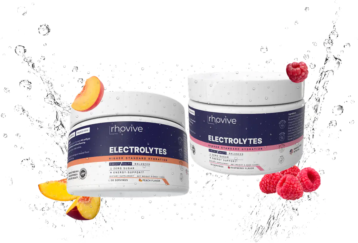 A jar of Rhovive Peach and a jar of Rhovive Raspberry with their fruit in a splash of water
